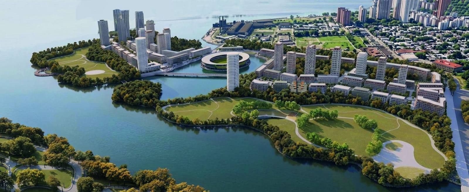 Vista aérea del masterplan con la bahía central y el parque